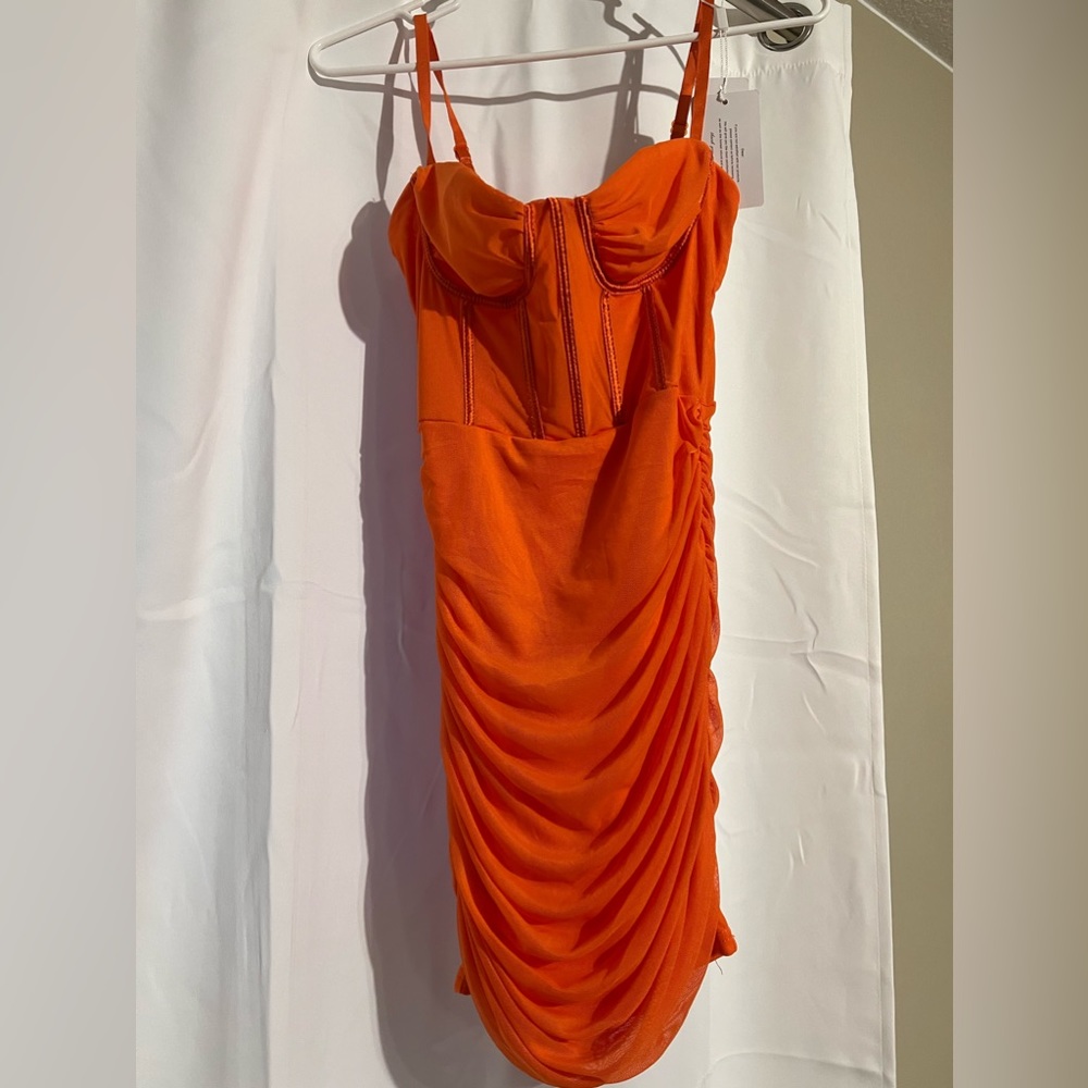 Bright orange body con dress!